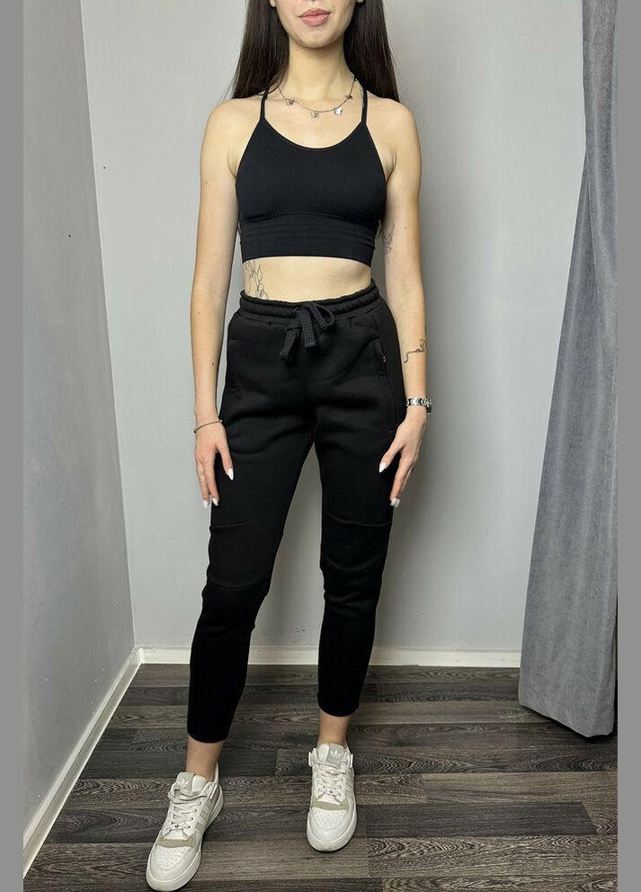 Жіночі штани трикотажні завужені чорні MKKS310823-1 Modna KAZKA (336932078)