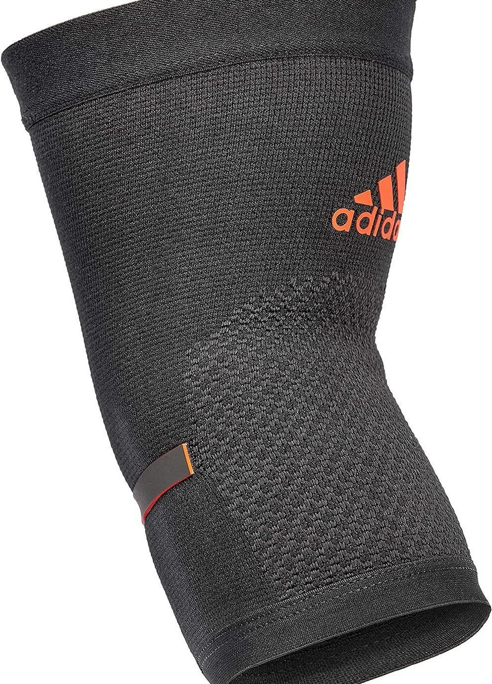 Фіксатор ліктя Performance Elbow upport чорний,червоний Уні adidas (333961433)