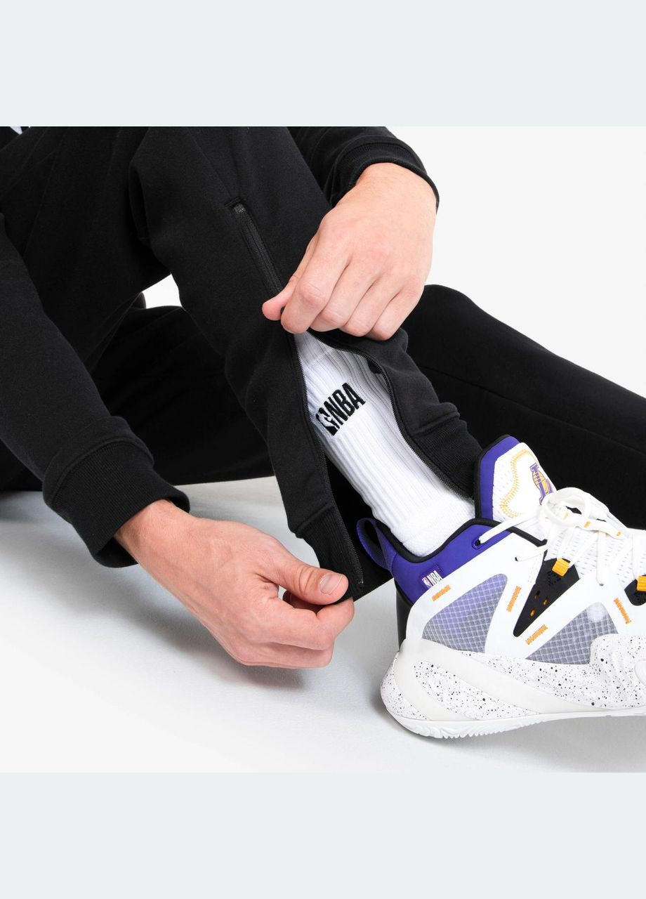 Черные демисезонные брюки TARMAK