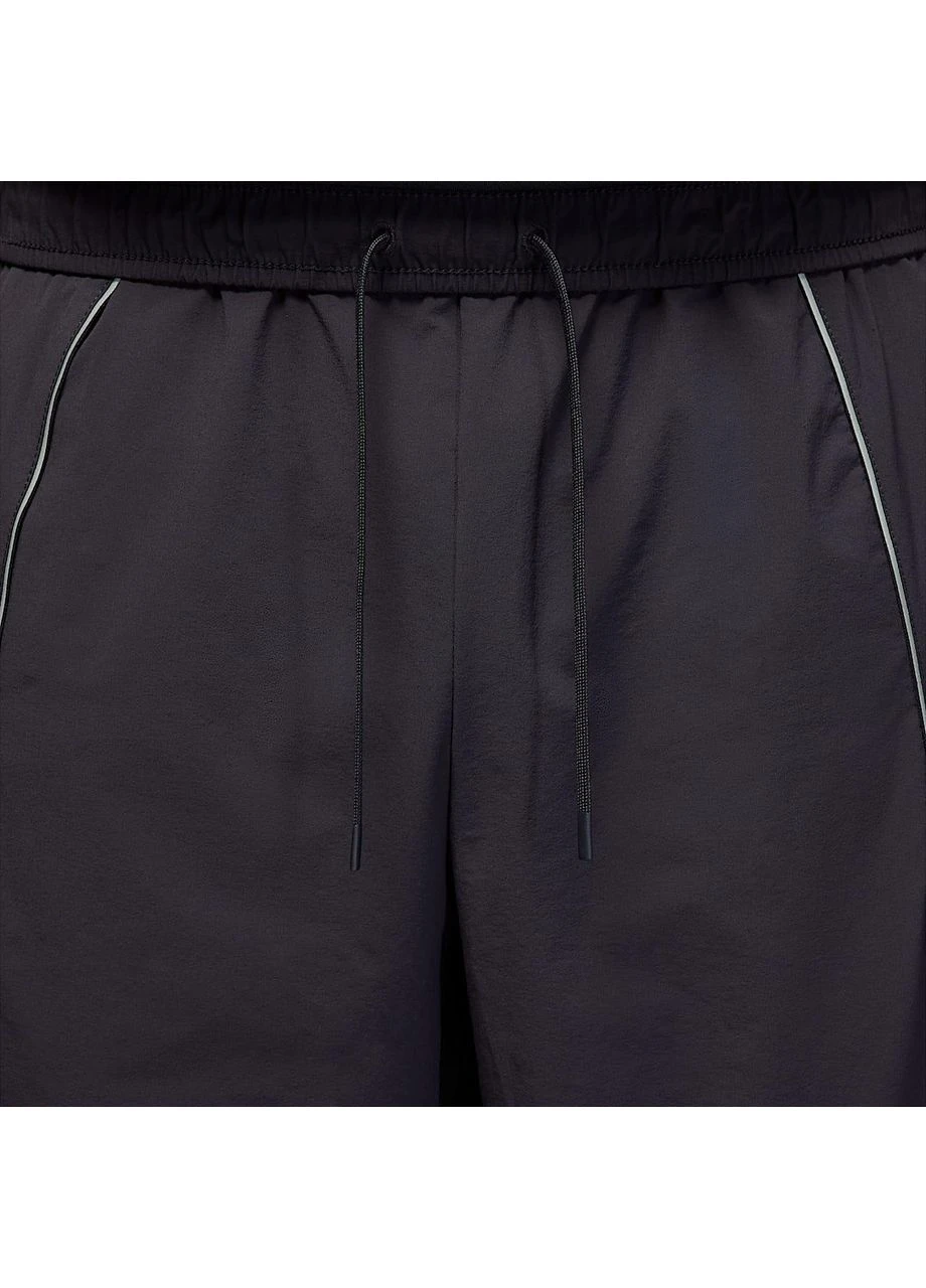 Черные демисезонные брюки Nike