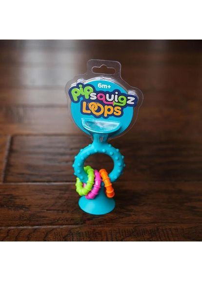 Прорезыватель-погремушка на присосках pipSquigz Loops, бирюзовый () Fat Brain Toys FA166-1 (370498621)