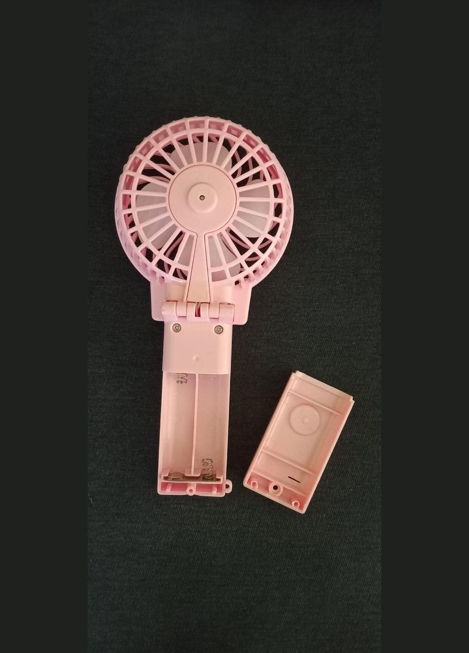 Портативный ручной вентилятор TOYS на батарейках розовый No Brand (302517929)