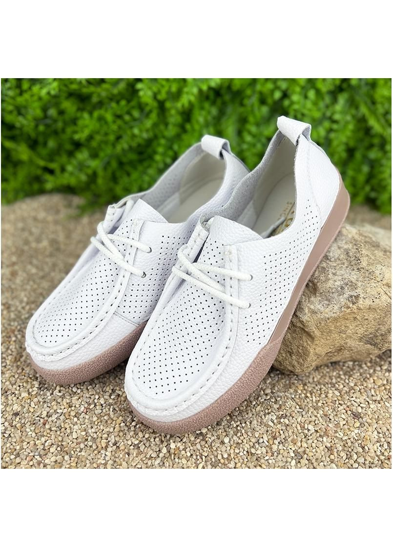 Белые жiночi перфорованi мокасини шкiрянi е-007035-2 бiлi Kadisailun