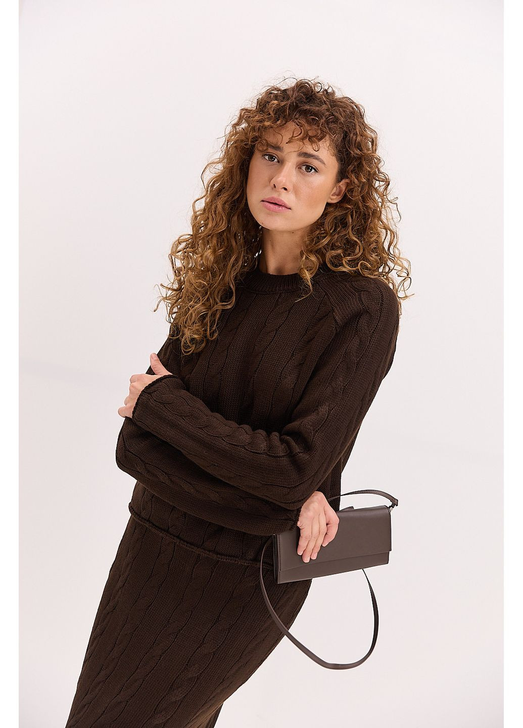 Жіночий вязаний костюм зі спідницею і джемпером чорний Arjen (361056672)