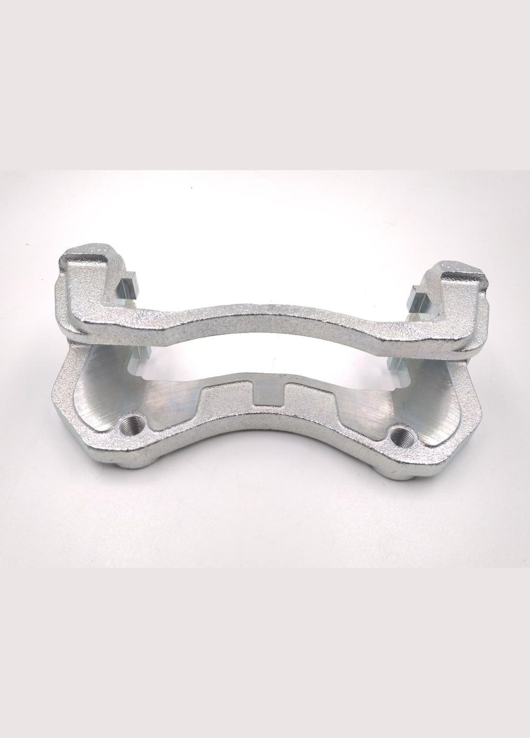 Оригінальна скоба гальмівного супорта MR307282 LANCER, Лансер, OUTLANDER, Аутлендер Mitsubishi (345738069)