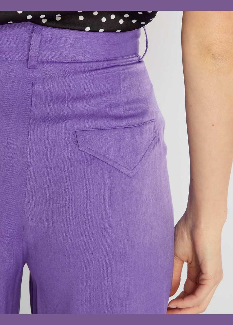 Фиолетовые брюки Kiabi