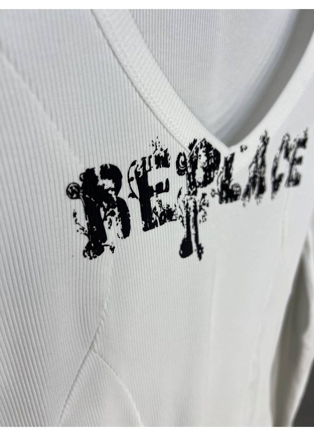 Лонгслів жіночий A-N 25079 рубчик реглан v-виріз з написом принт корсетні шви one size No Brand (317226792)