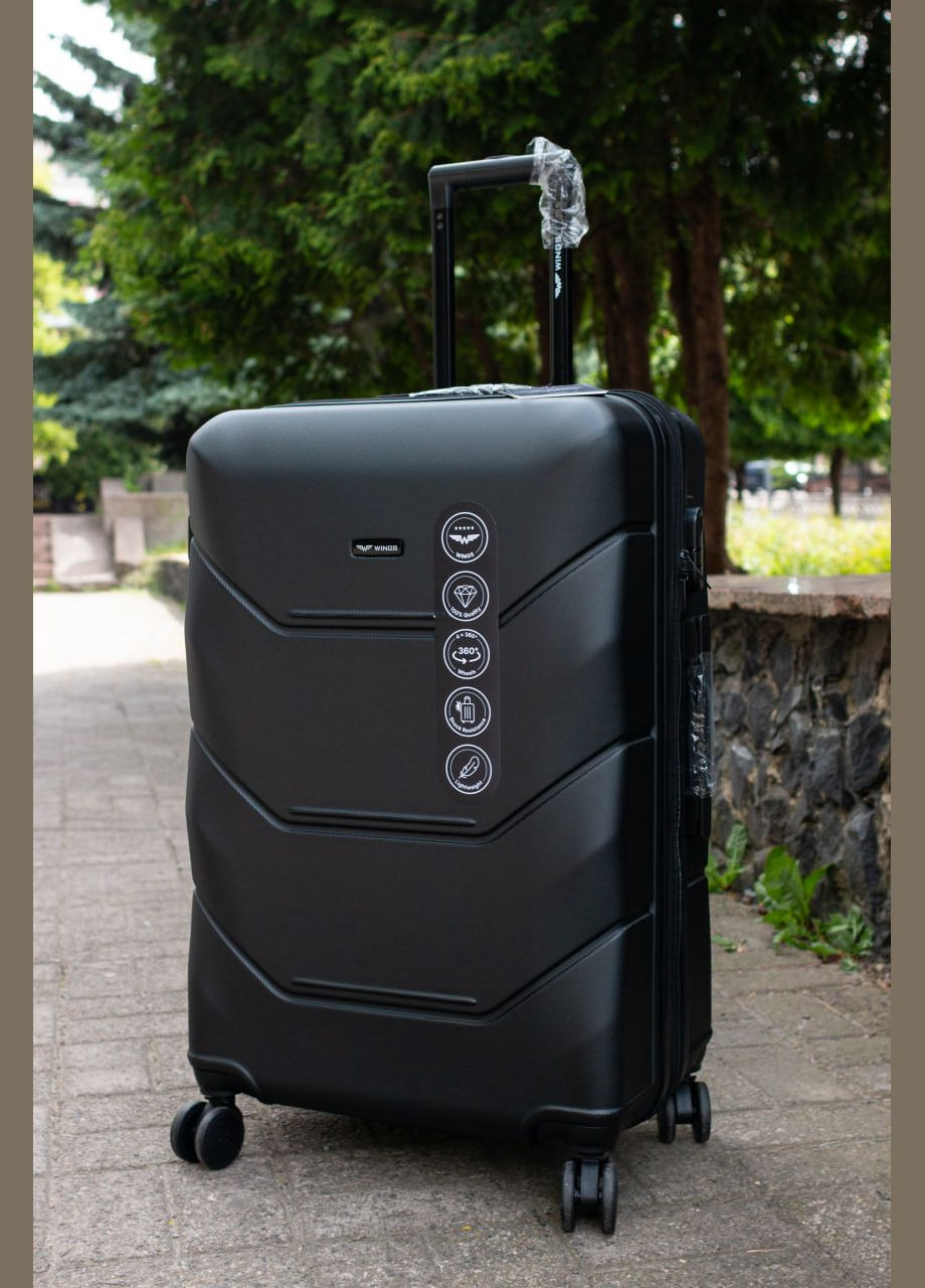 Валіза пластикова середня M з розширенням, колір чорний Wings 149 (346818679)