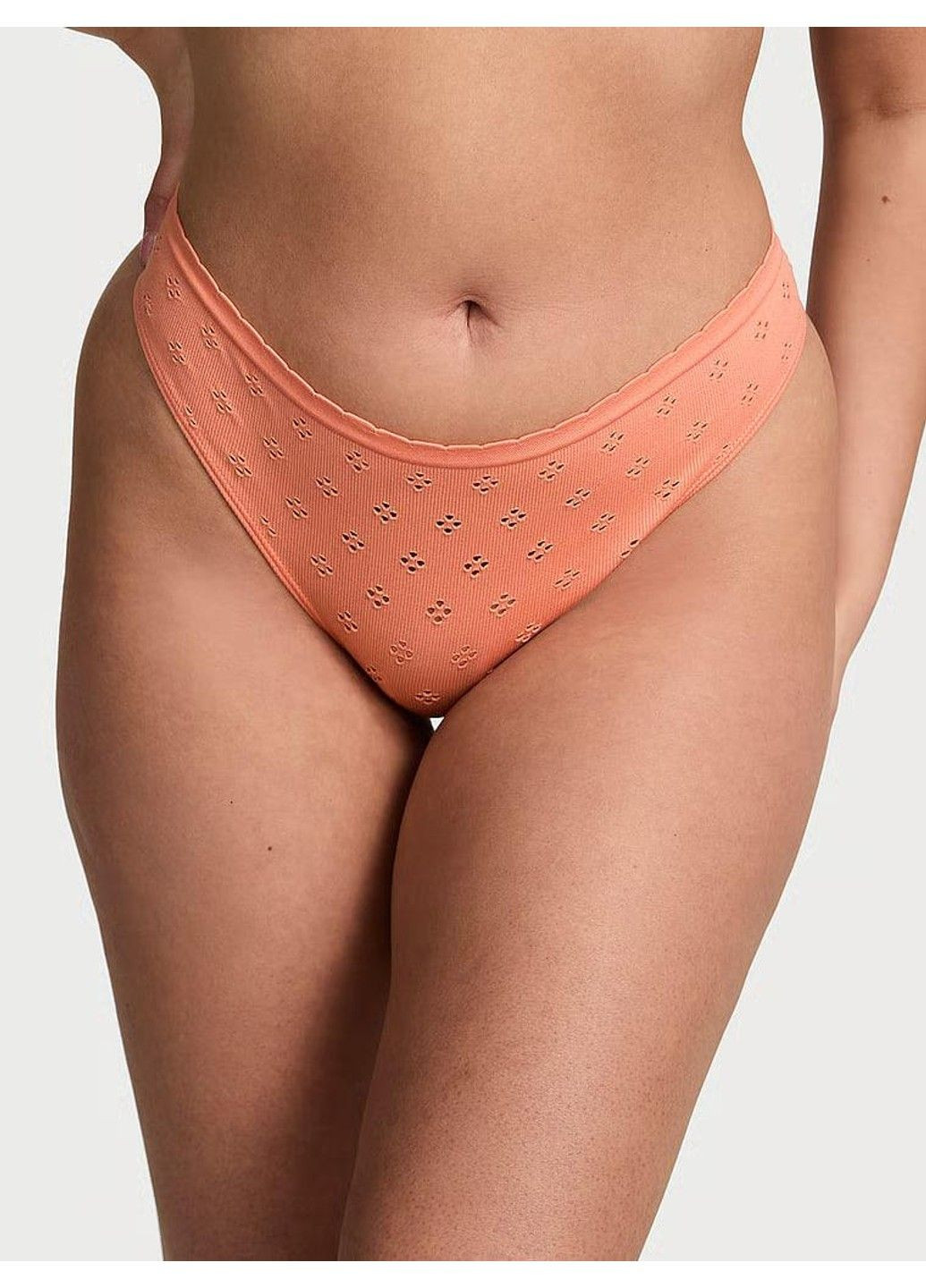 Трусики-стринги женские с микрофибры Seamless Eyelet Thong Panty персиковые Victoria's Secret (347723750)