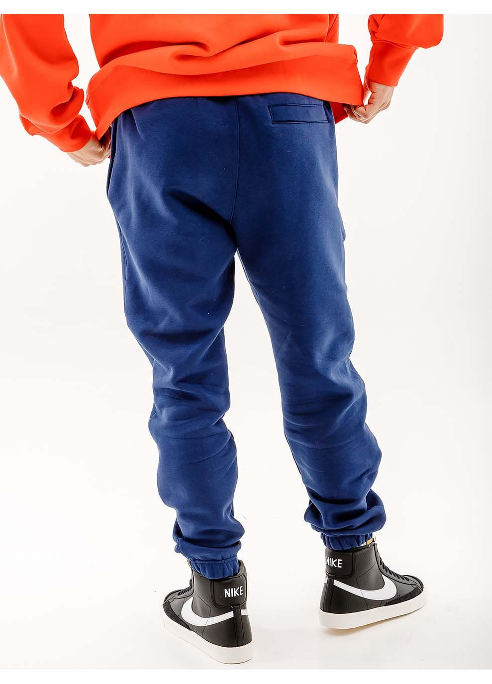 Синие демисезонные брюки Nike