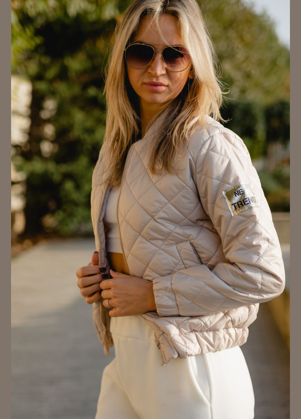 Бежева жіноча куртка колір світлий беж р.50/52 408681 New Trend