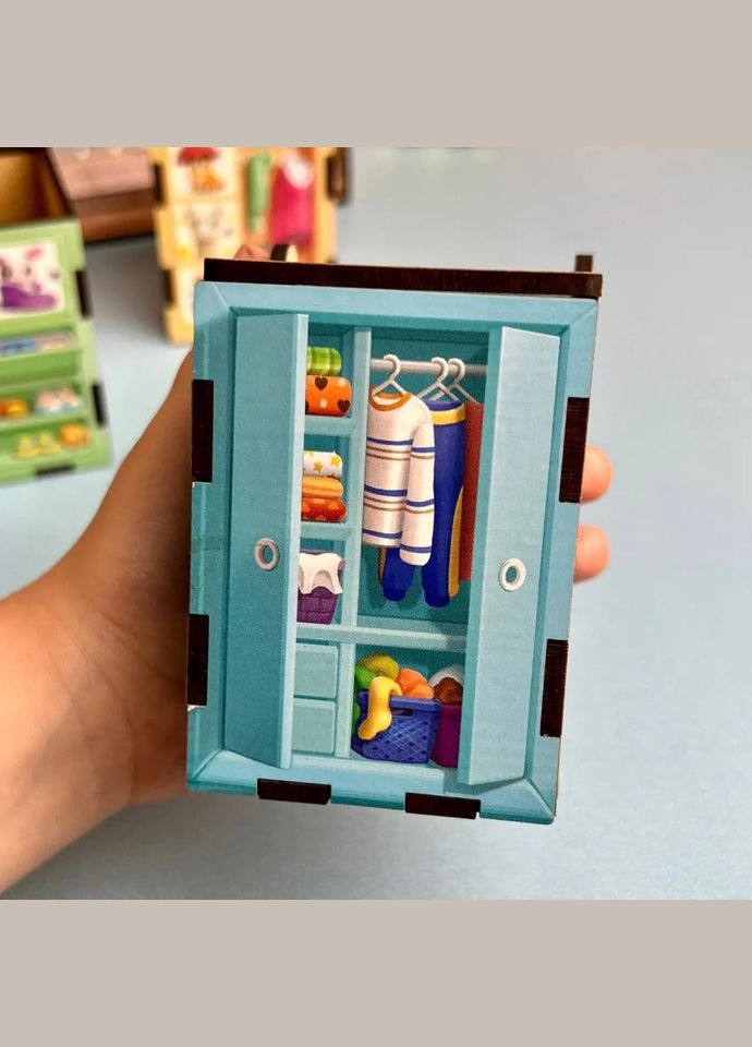 Дерев'яна настільна гра "Шафи з одягом" (ПСД061) PSD061 сортер-комодик Ubumblebees (316272301)