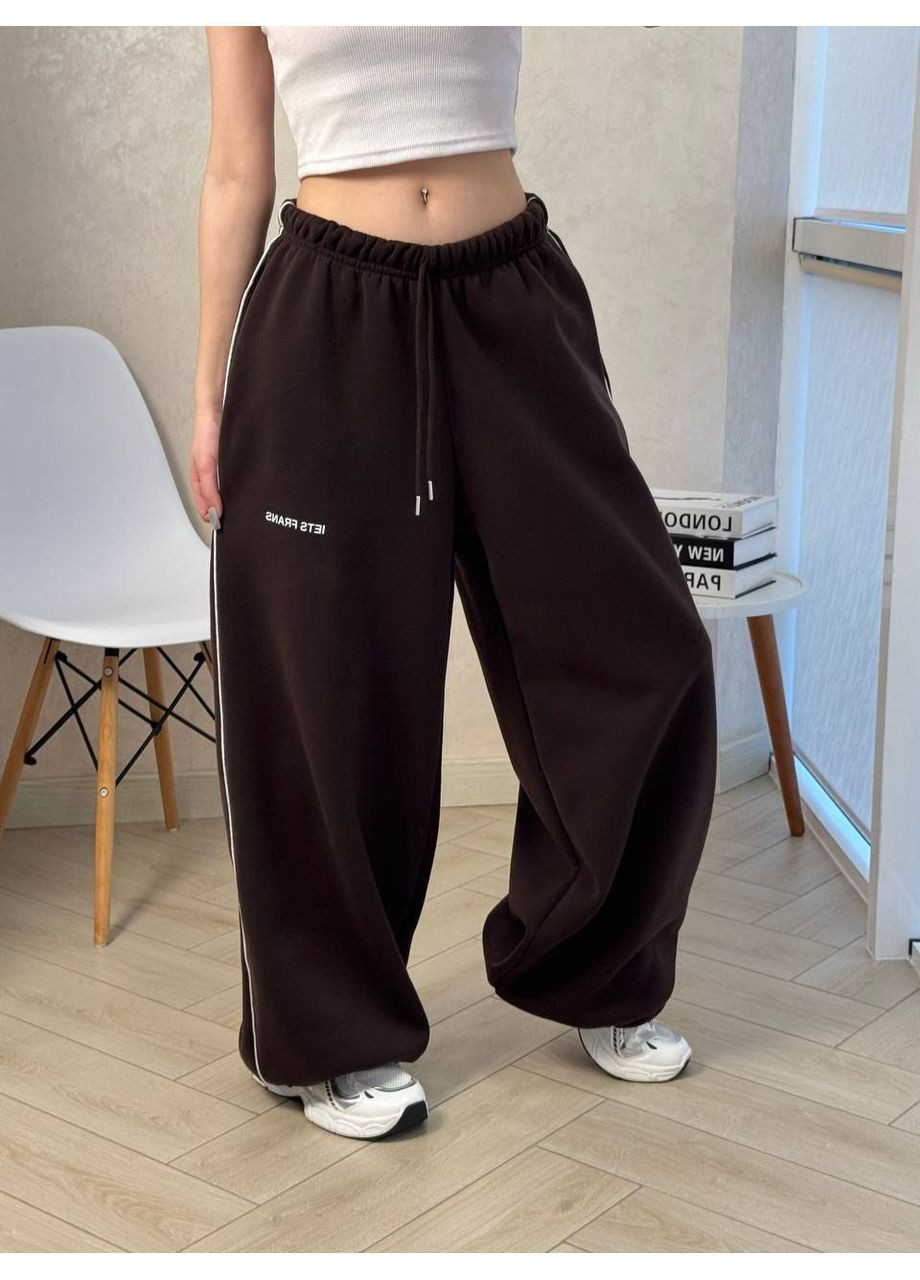 Женские теплые объемные брюки с затяжками снизу Nositi (365701110)