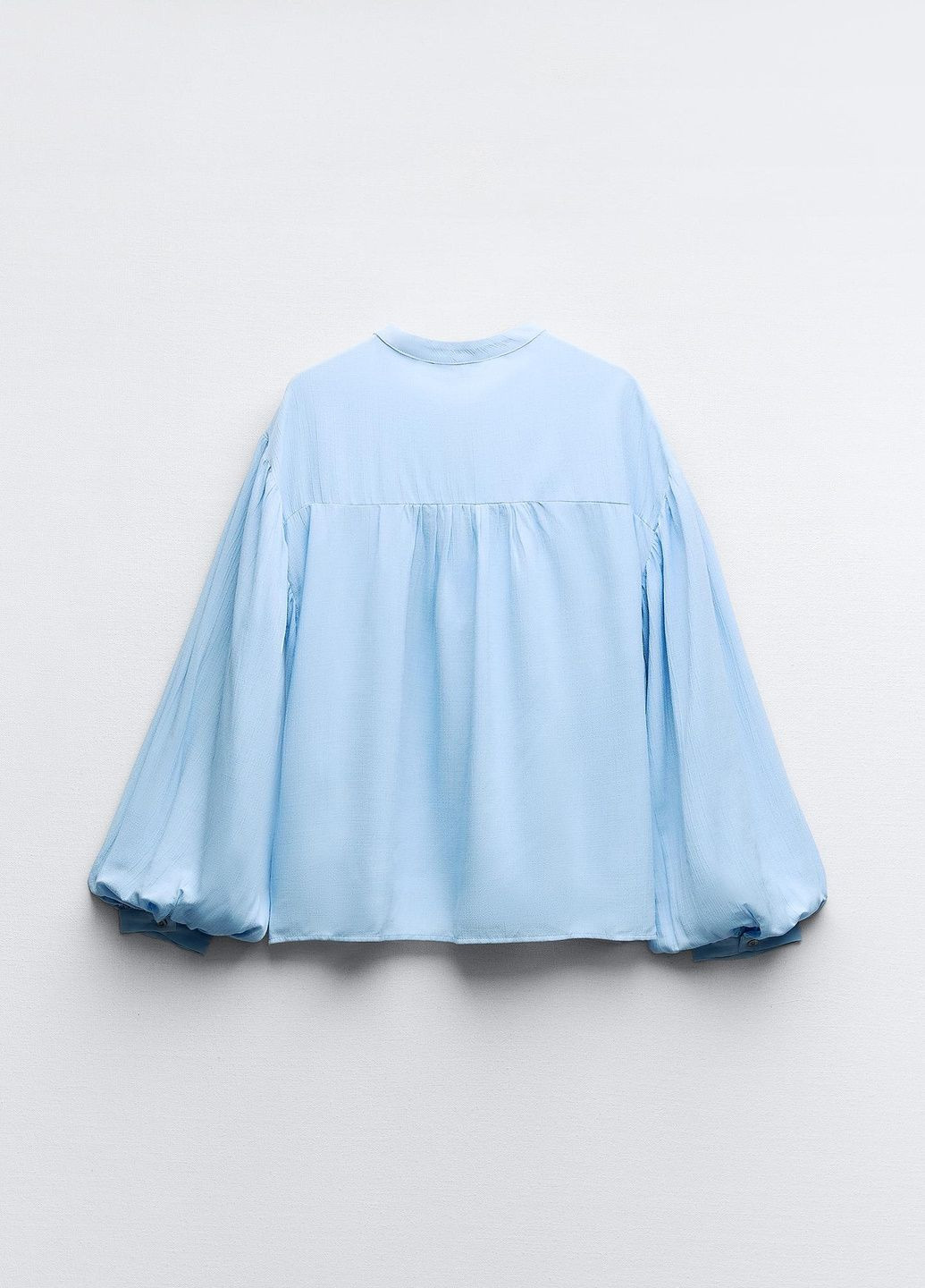 Світло-блакитна демісезонна блузка Zara