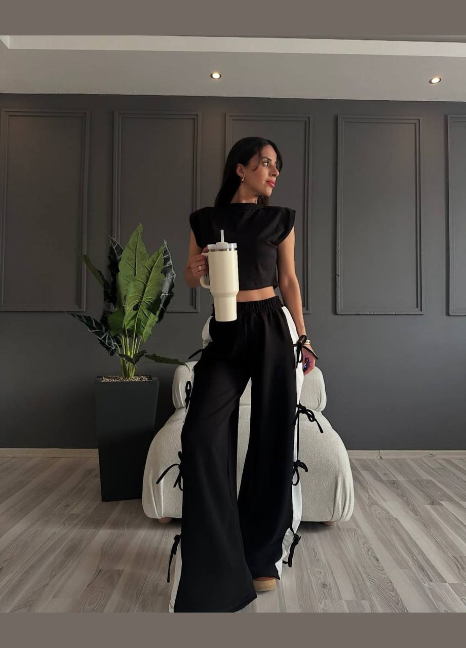 Обьемные женские штаны с лампасами Nositi (327738454)