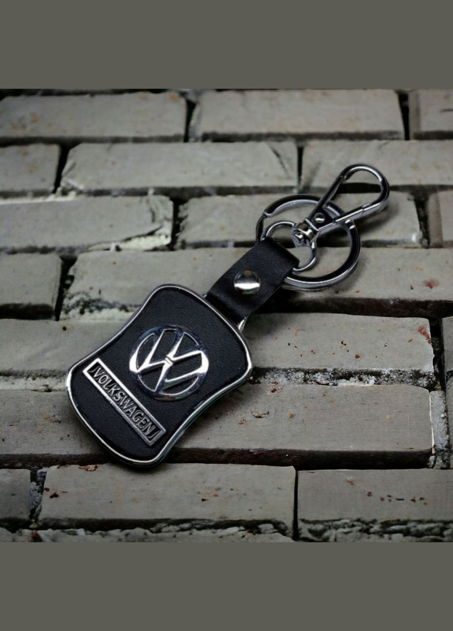 Брелок з логотипом авто, карабін та кільце, металевий зі вставками натуральної шкіри. Volkswagen (331018718)