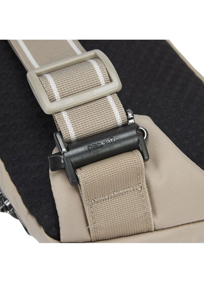 Сумка через плече V Action Sling Beige (60161237) Pacsafe (392663231)