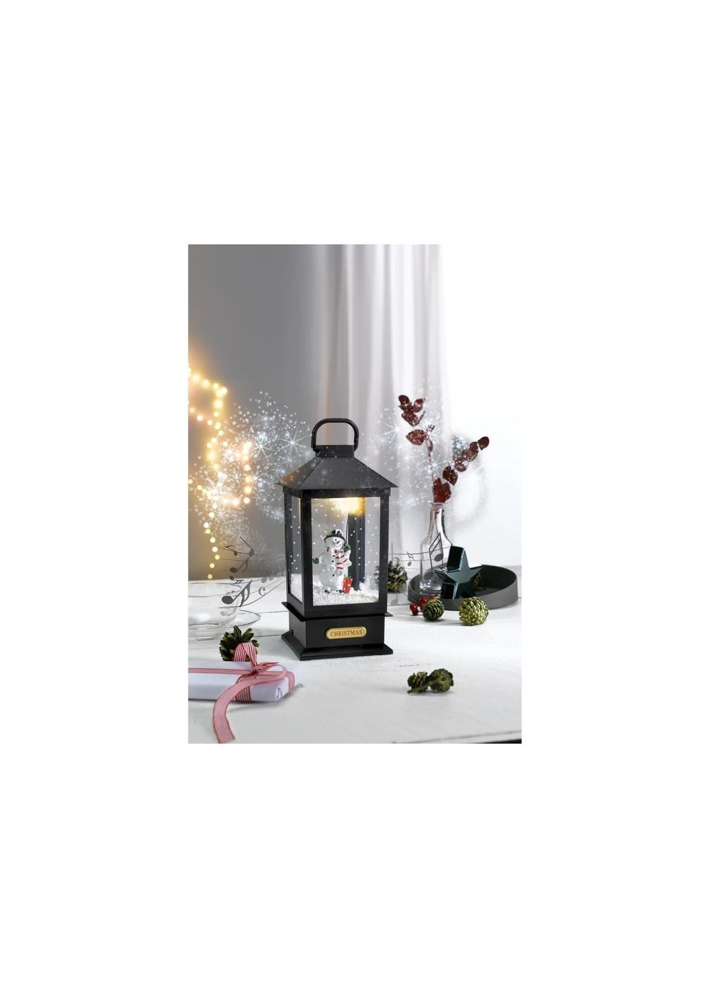 Новорічний ліхтар Сніговик з музикою і снігом 30 см Livarno home (362045991)