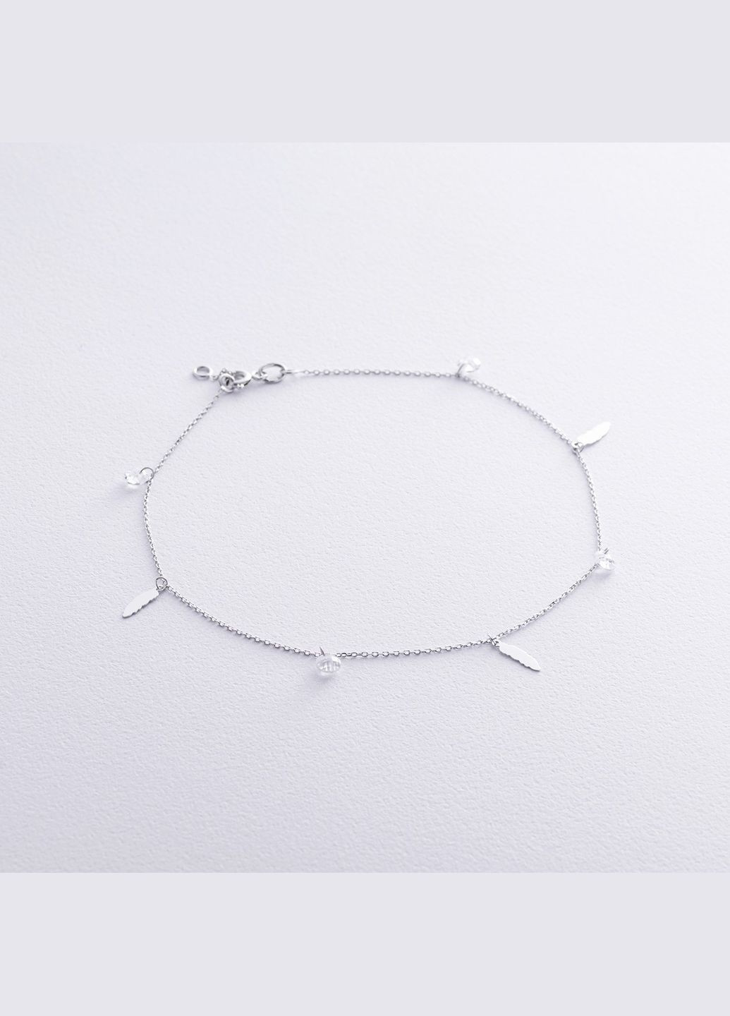 Золотий браслет Пір'їнки на ногу (фіаніти) б05367 27 27 Oniks (323426230)