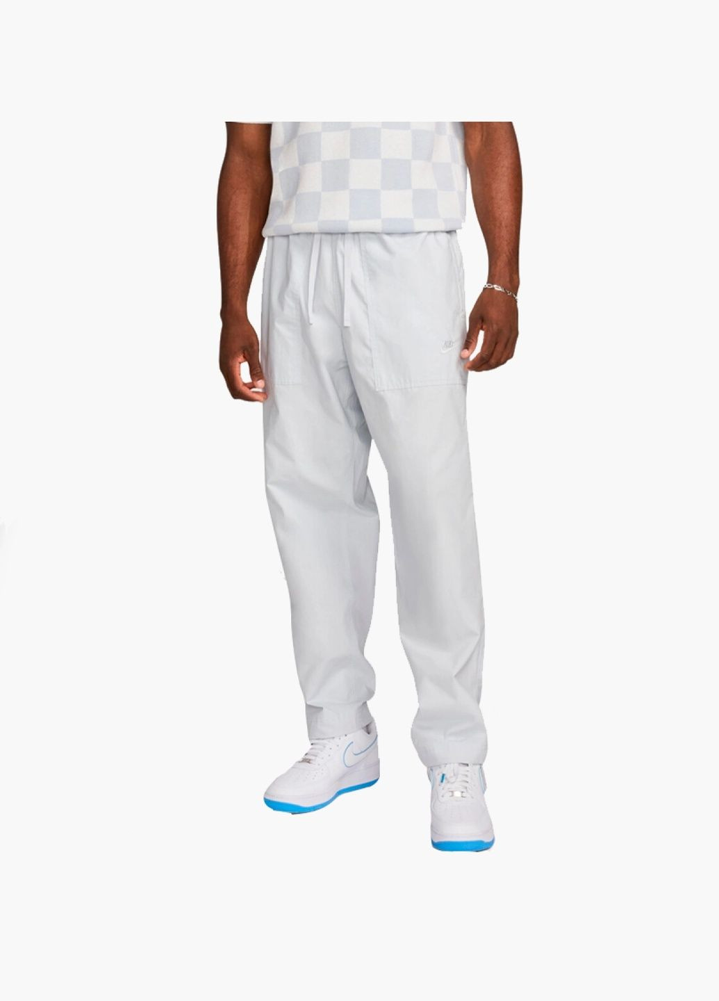 Белые демисезонные брюки Nike