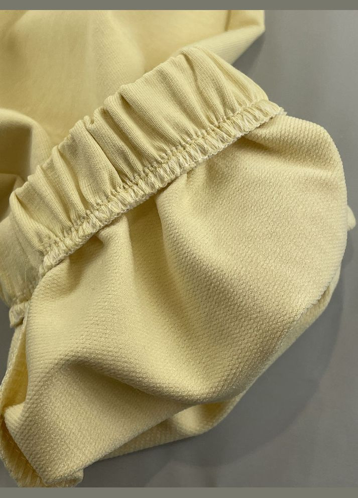 Желтый демисезонный спортивный костюм для девочки Mevis