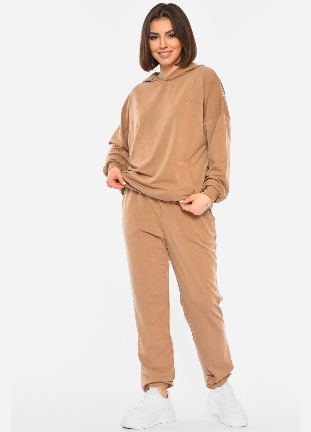 Спортивний костюм жіночий батальний бежевого кольору однотонний Let's Shop (305741608)