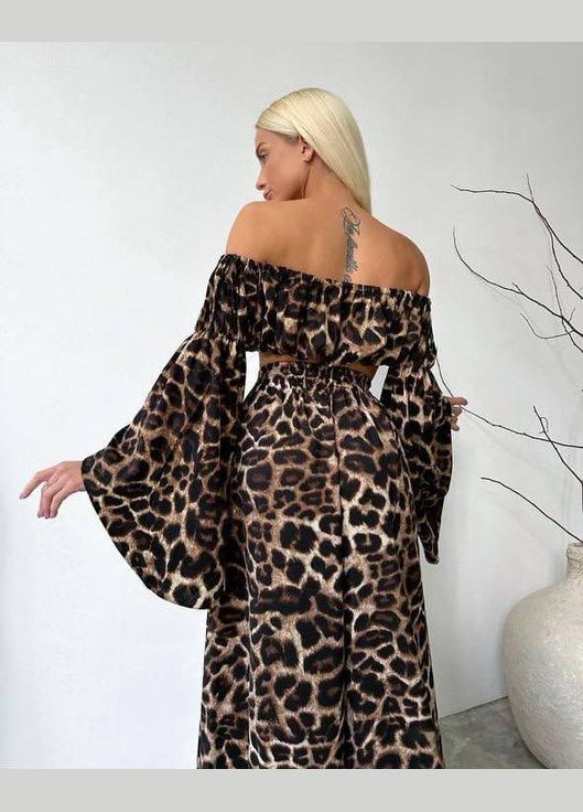 Женский костюм двойка топ с рукавами-клеш и широкие брюки с разрезом MonCher (331332579)