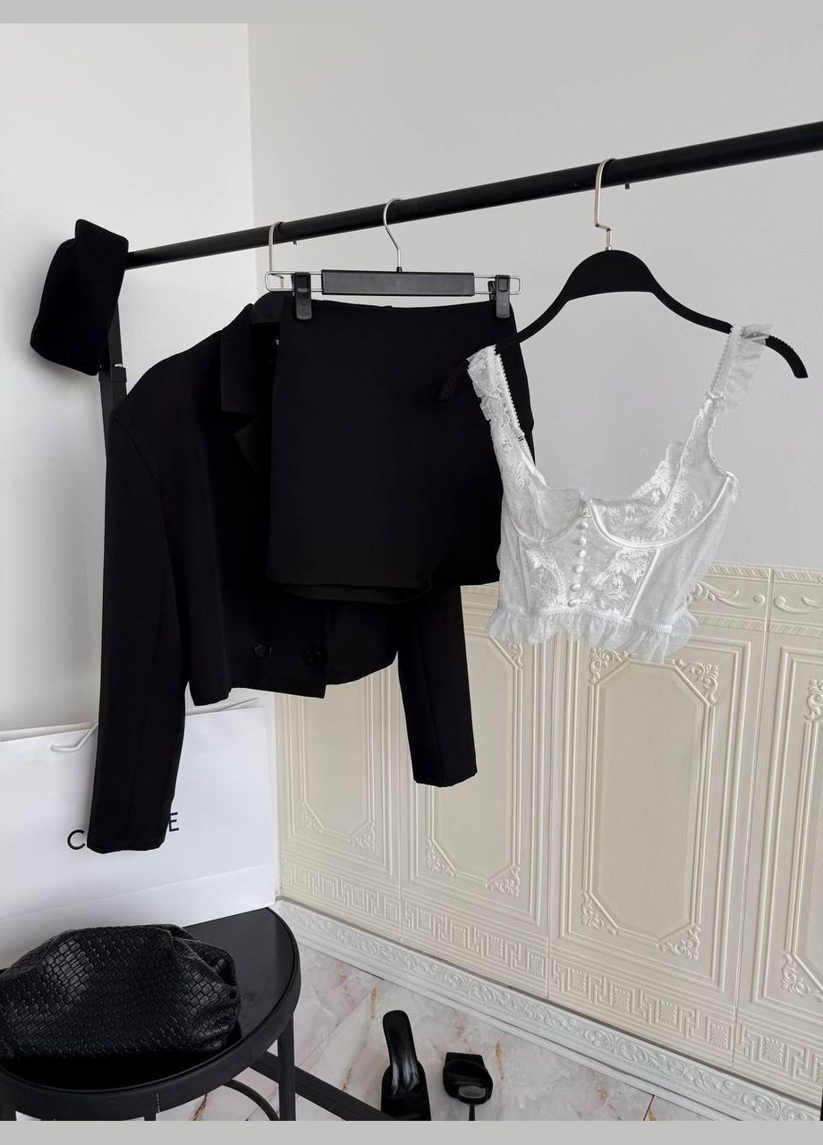 Женский костюм с юбкой-шортами и жакетом. Adelante (322764101)