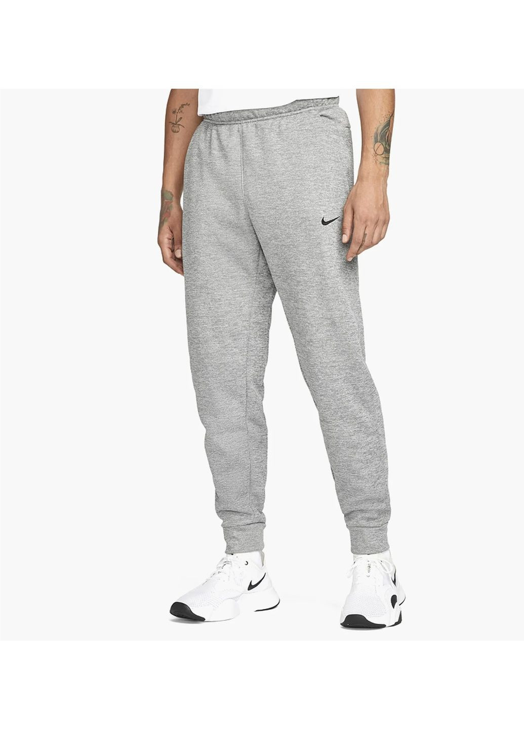 Серые демисезонные брюки Nike