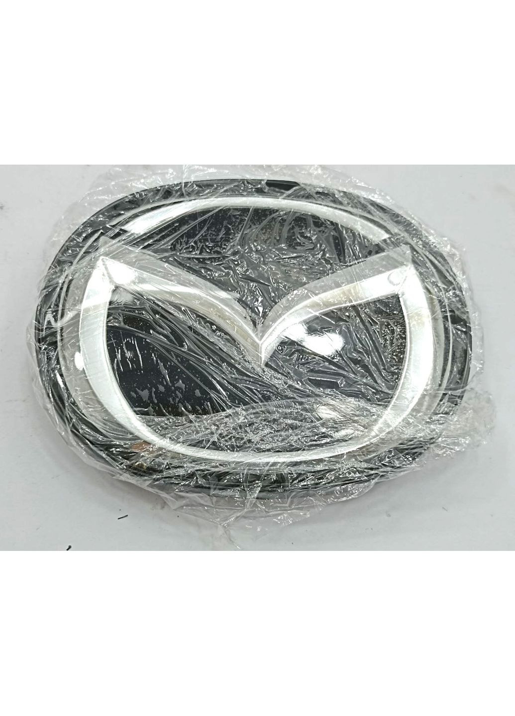 Емблема решітки 6 (2011-2016р) чорна+хром 141х112 мм під склом (на напрямних) Mazda (369611000)