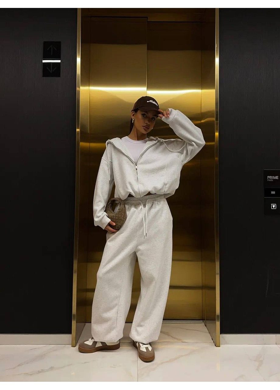 Жіночий спортивний костюм з капюшоном і широкими штанами Україна (358644004)