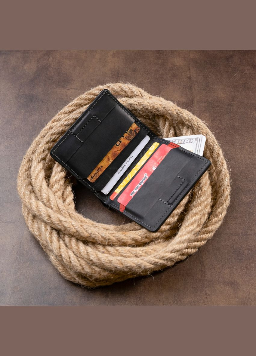 Функціональне тонке портмоне 11326 Черне Grande Pelle (329147287)