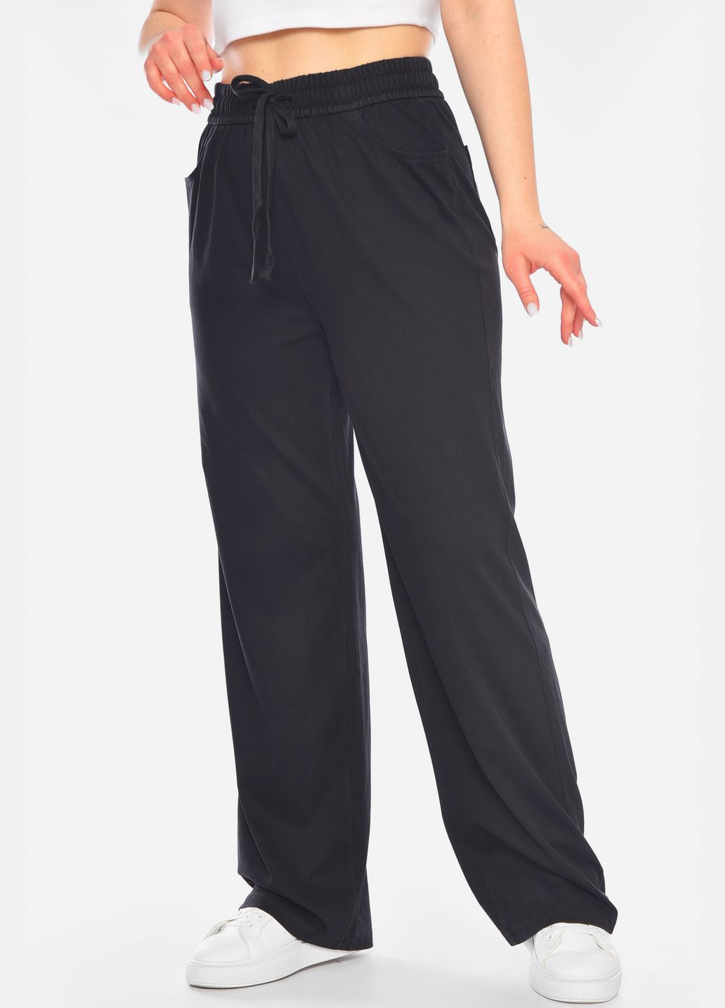 Штани жіночі однотонні напівбатальні чорного кольору Let's Shop (322668671)