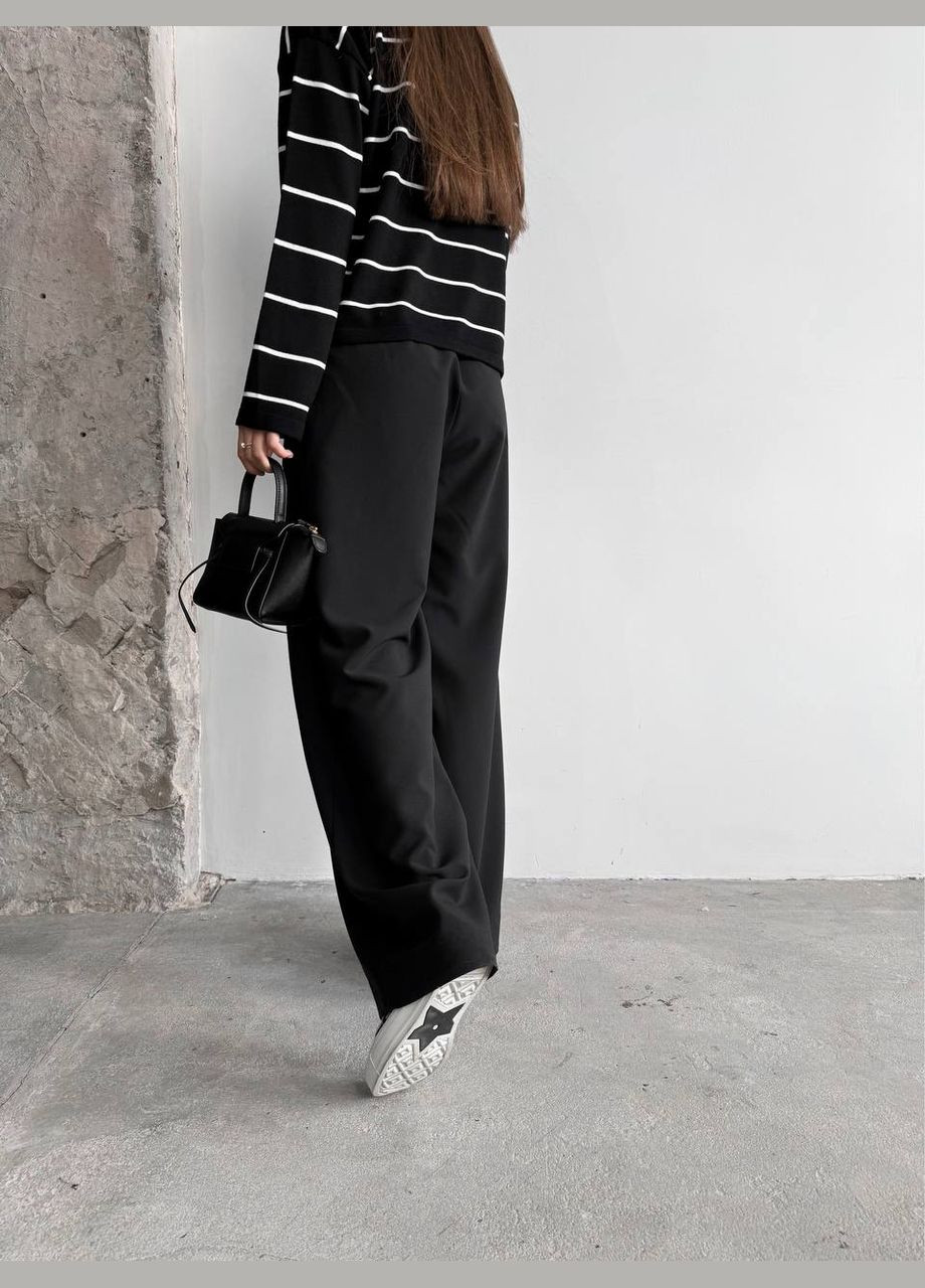 Жіночі брюки з декоративним шнурком колір чорний р.42 451517 New Trend (282926359)