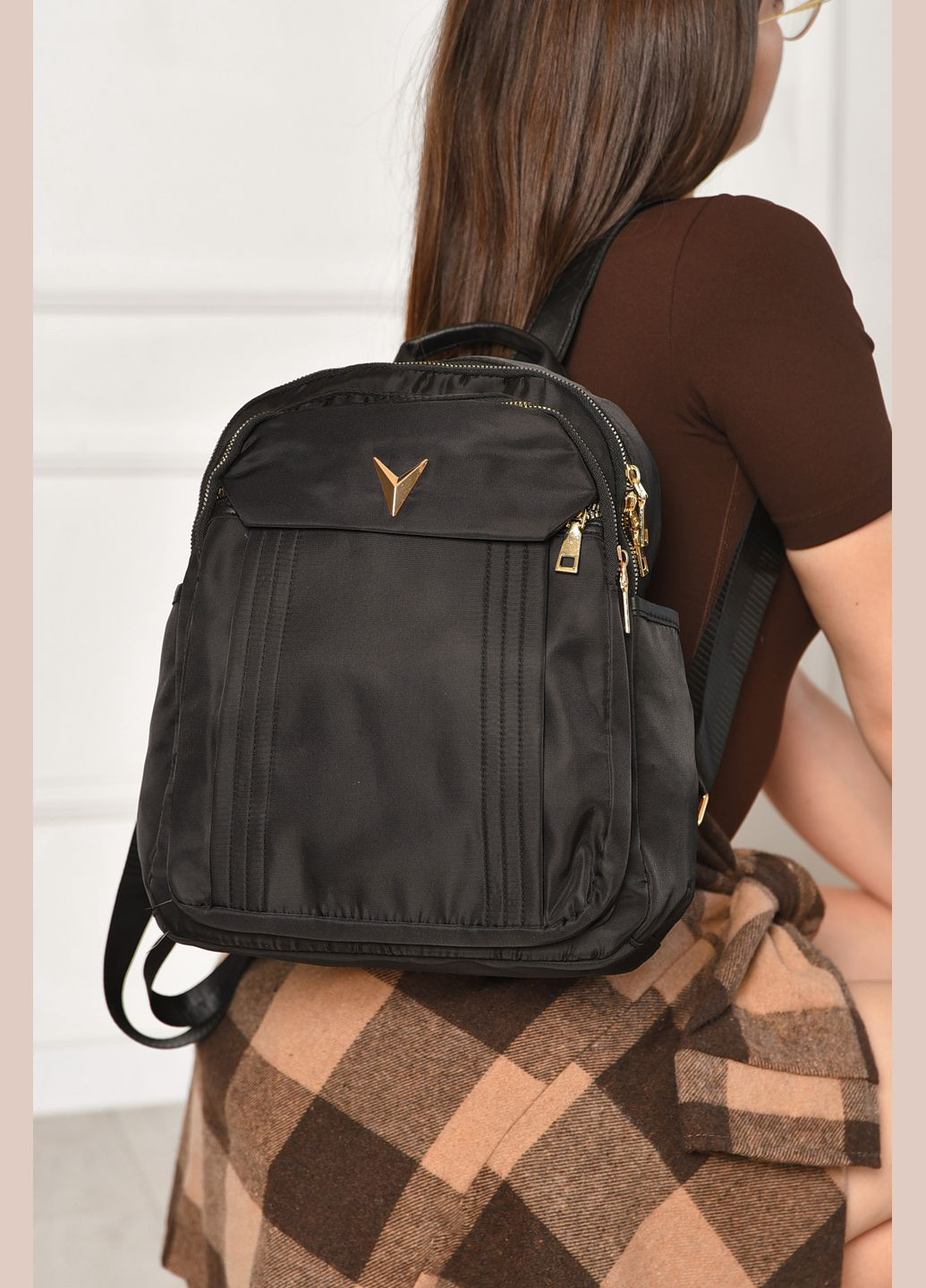 Рюкзак жіночий однотонний чорного кольору Let's Shop (346815514)