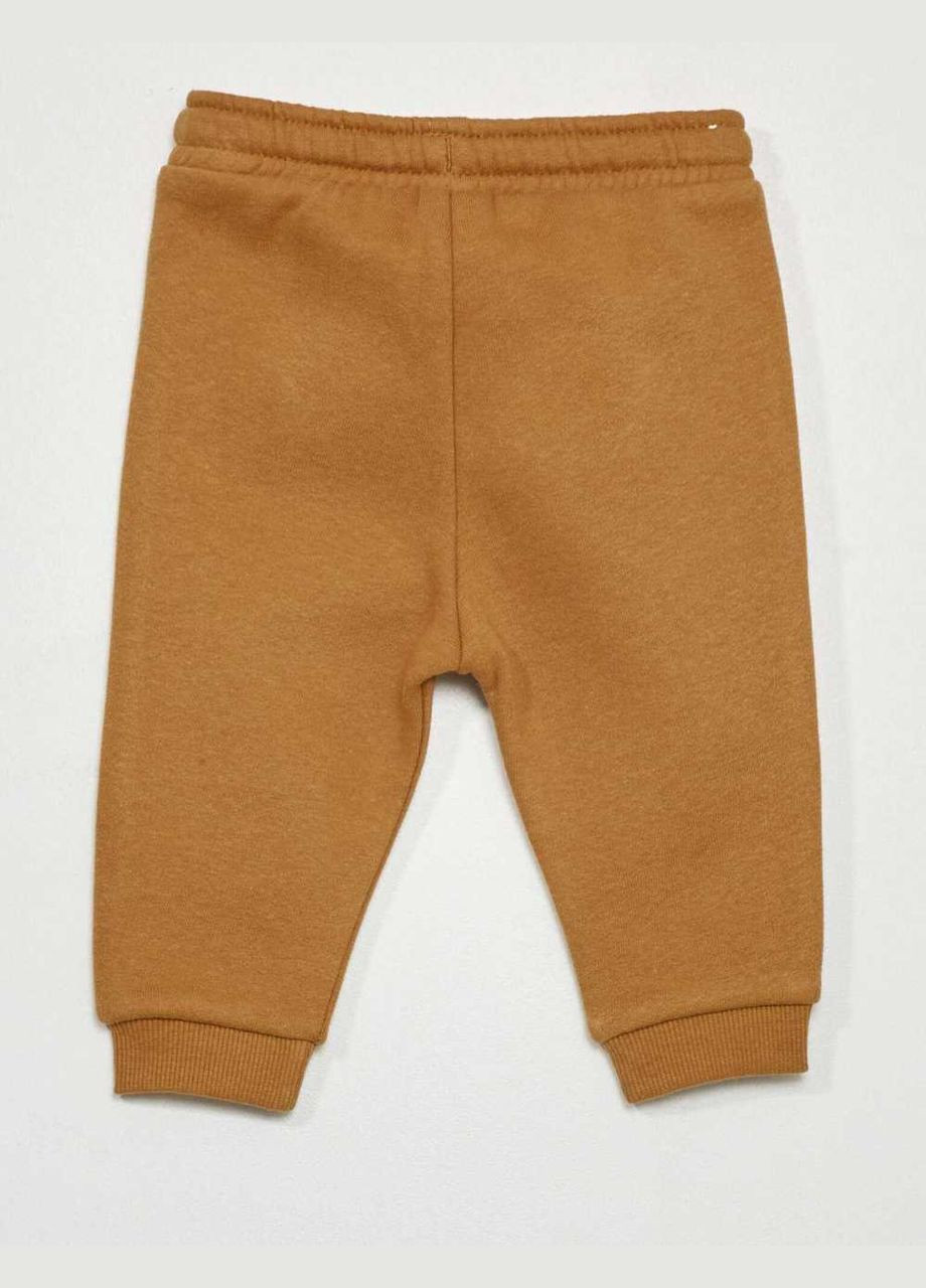 Светло-коричневые брюки Kiabi
