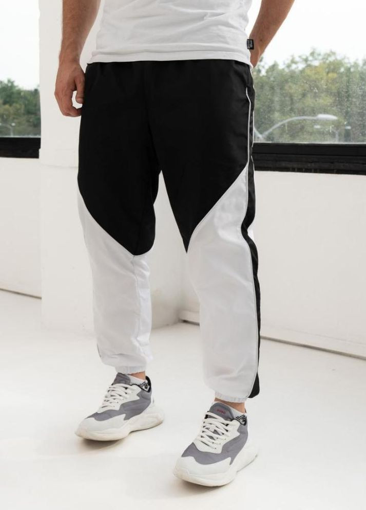 Спортивні штани чоловічі плащівка на манжетах No Brand (307151890)