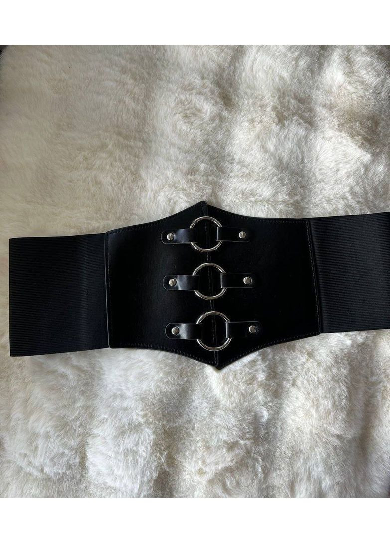 Утягивающий декоративный пояс корсет из экокожи с декоративными кольцами с заклепками эластичный No Brand Корсет декоративний з кільцями чорний (349507890)