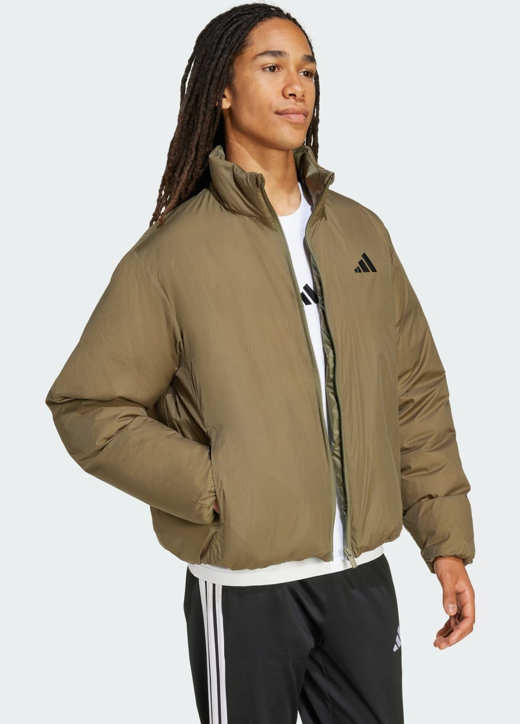 Зелена демісезонна пуховик essentials climawarm puffer adidas