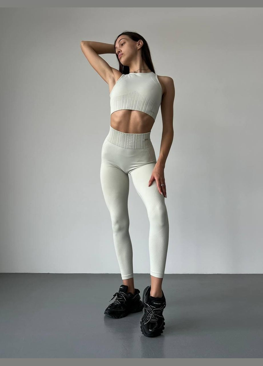 Спортивний костюм «NAQIYAYABEI» (топ та легінси) з чашками та ефектом пуш-ап, молочного кольору, розмір S Trends (330756804)