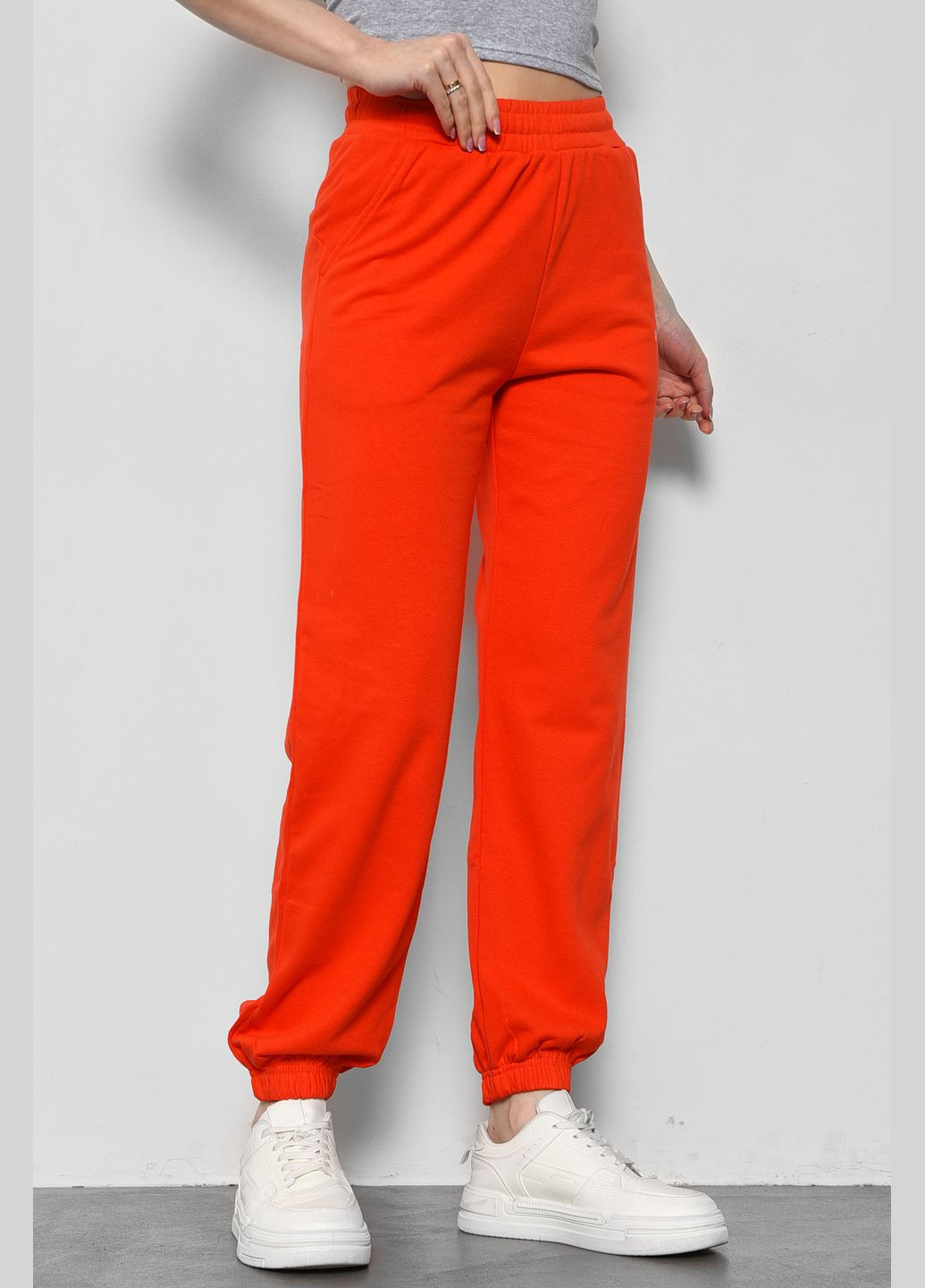 Спортивні штани жіночі помаранчевого кольору Let's Shop (291683312)