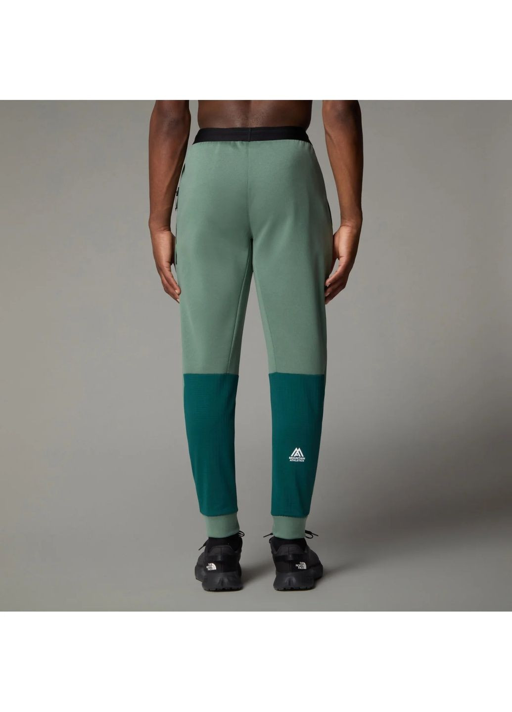 Зеленые демисезонные брюки The North Face