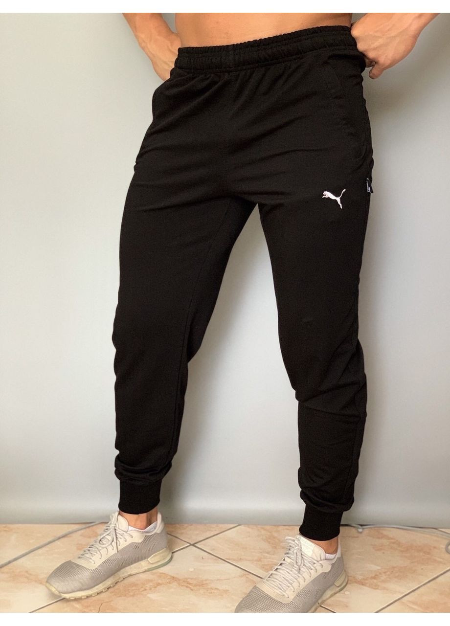 Черные брюки Puma