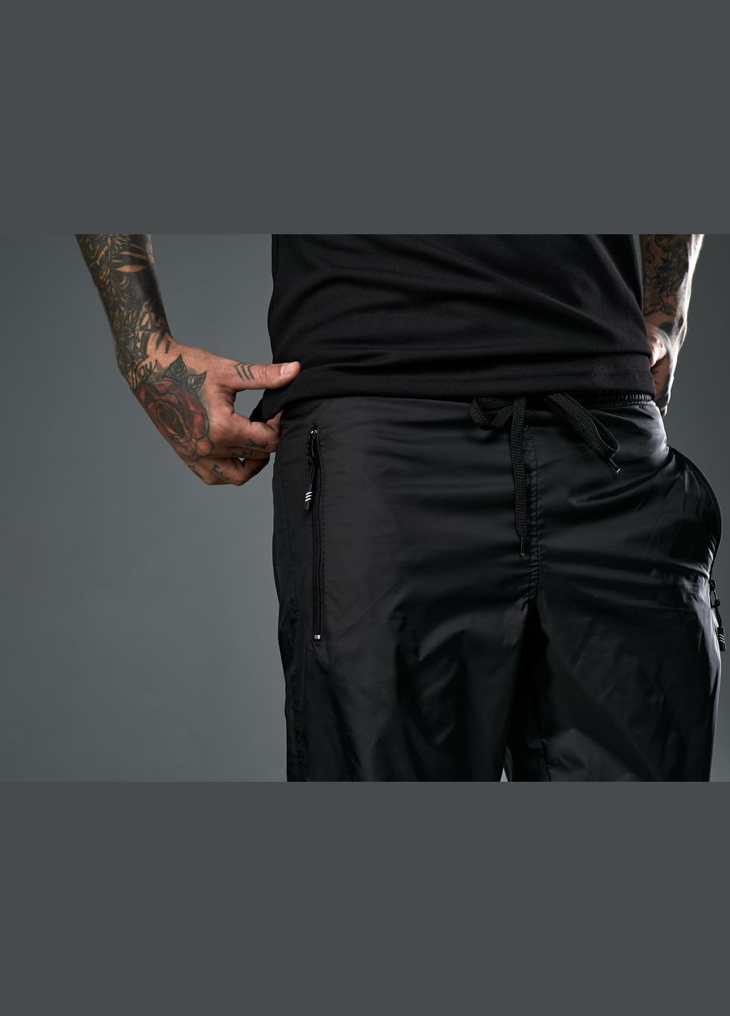 Черные спортивные демисезонные брюки Tailer
