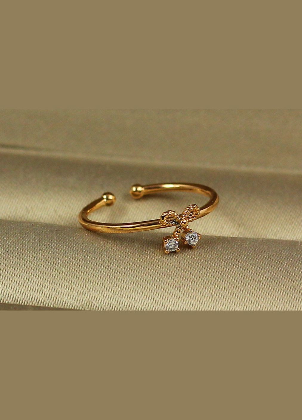 Кільце дитяче розсувне вишенька з бантиком р14 і більше золотисте Xuping Jewelry (317204449)