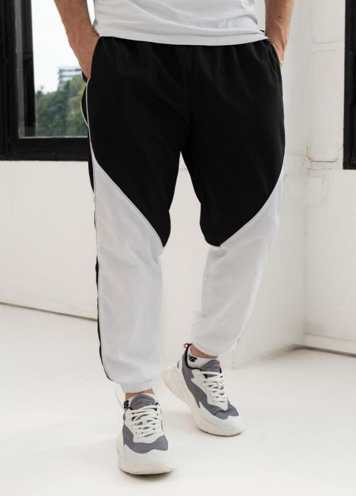 Спортивні штани чоловічі плащівка на манжетах No Brand (307151890)
