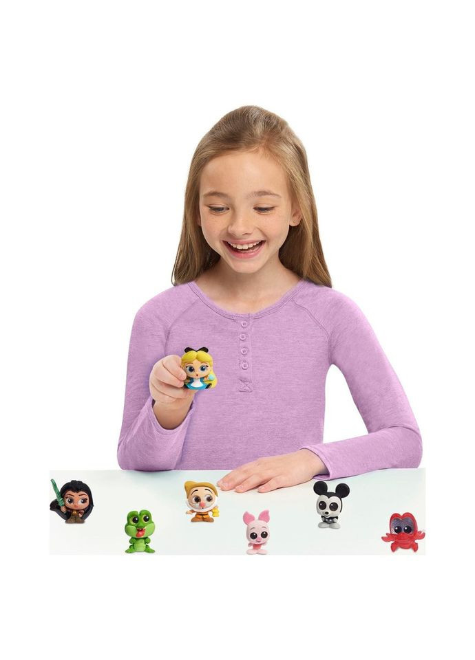 Колекційна фігурка-сюрприз "Чарівні герої" 44579 іграшка 3 см Disney Doorables (328440107)