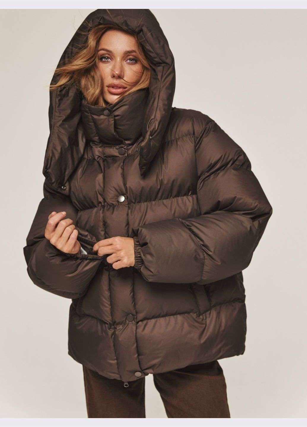 Коричнева зимня пуфер зі знімним капюшоном коричневий Dressa