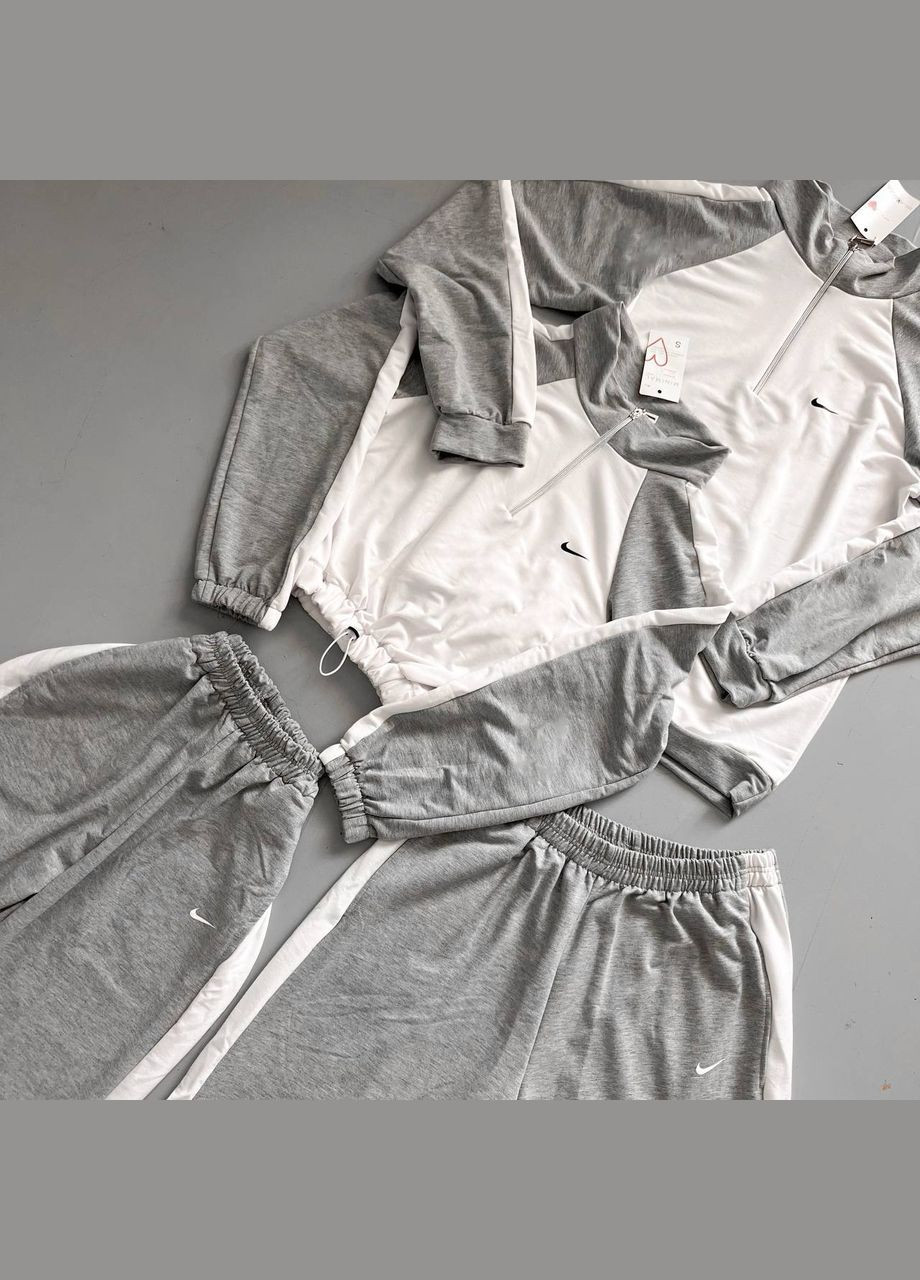 Светло-серый демисезонный стильный костюм весенний Adelante