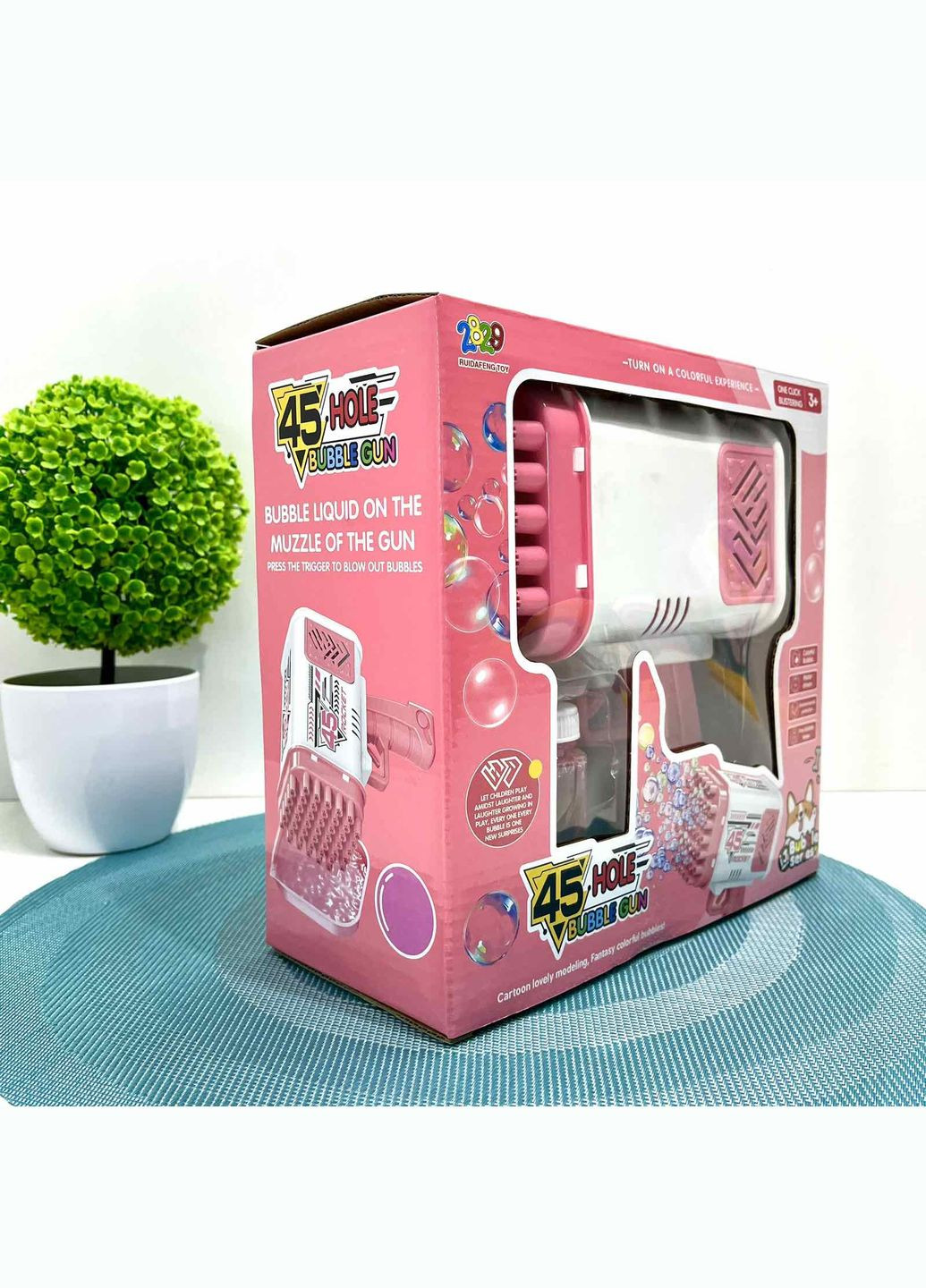 Пістолет для запуску мильних бульбашок 45 отворів 17 см Рожевий (2023-58A) TK Group (325692334)